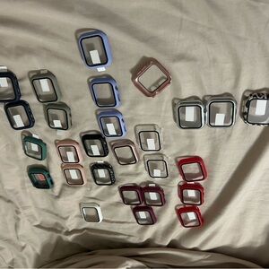 27 Cases Tempered Glass Screen Protector for Apple Watch 40mm.  21 brand new